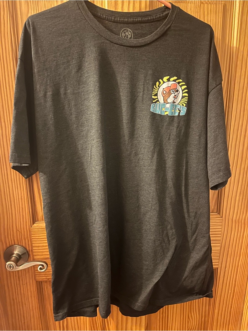Black Short Sleeve Graphic Tee with Colorful Crest